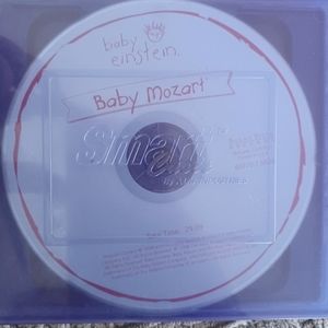FREE WITH PURCHASE.  Baby Einstein Baby Mozart CD and DVD digital board book set
